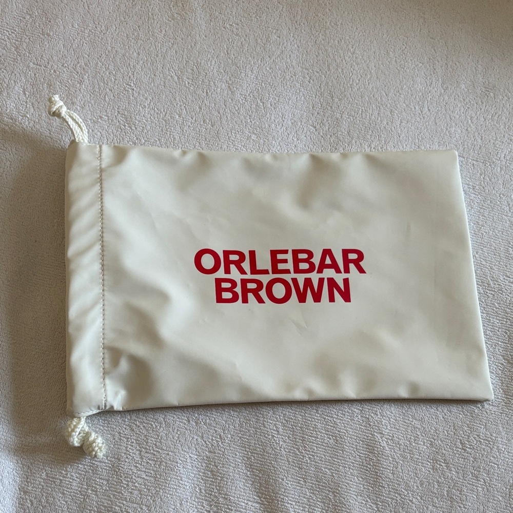 🌊 Orlebar Brown off-white rubberized drawstring pouch